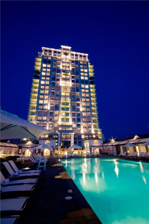 1 Tower Dr Unit 1502, Portsmouth, RI 02871 - pool at night featuring a community pool