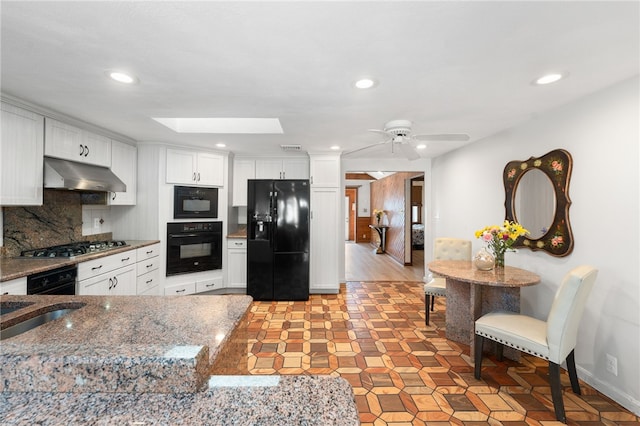kitchen with ceiling fan, white cabinetry, recessed lighting, under cabinet range hood, and black appliances