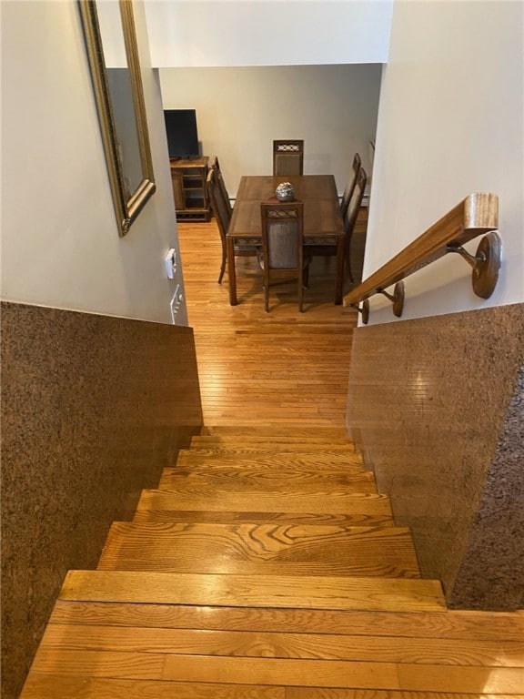 stairs with wood finished floors