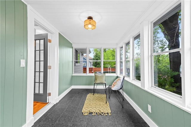 sunroom / solarium featuring a wealth of natural light