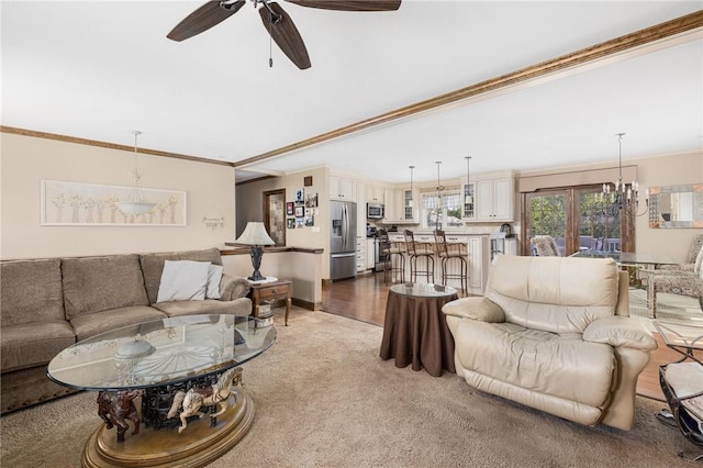 11 Renfrew Ave, Middletown, RI 02842 - carpeted living area with ornamental molding and ceiling fan