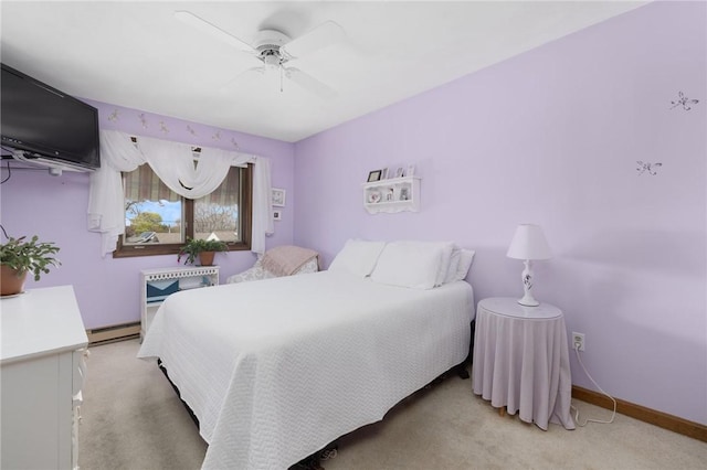 11 Renfrew Ave, Middletown, RI 02842 - bedroom with light carpet, a baseboard radiator, baseboards, and ceiling fan