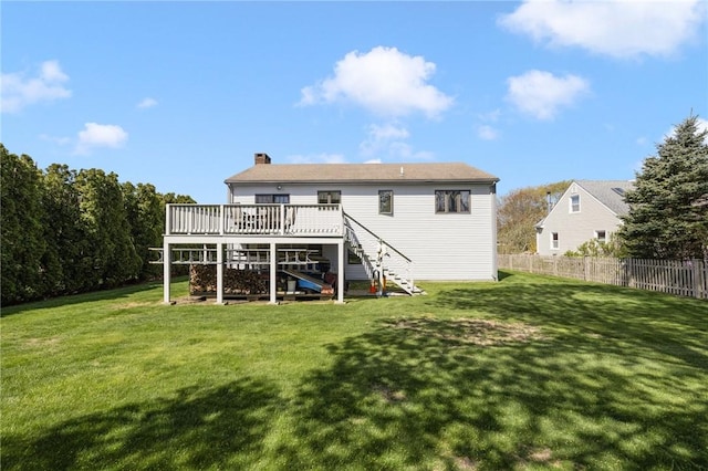 11 Renfrew Ave, Middletown, RI 02842 - back of property featuring stairway, a deck, and a chimney