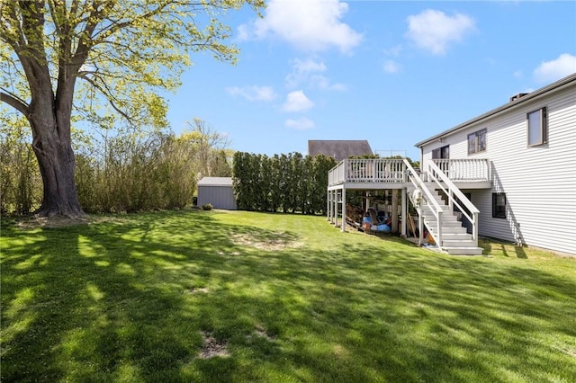 11 Renfrew Ave, Middletown, RI 02842 - view of green lawn with stairway and a deck