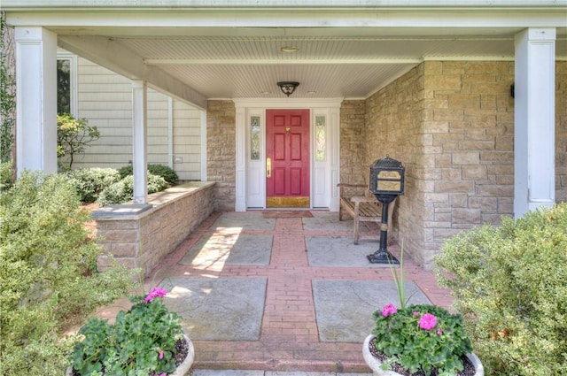 23 Pine Top Rd, Barrington, RI 02806 - doorway to property featuring a porch