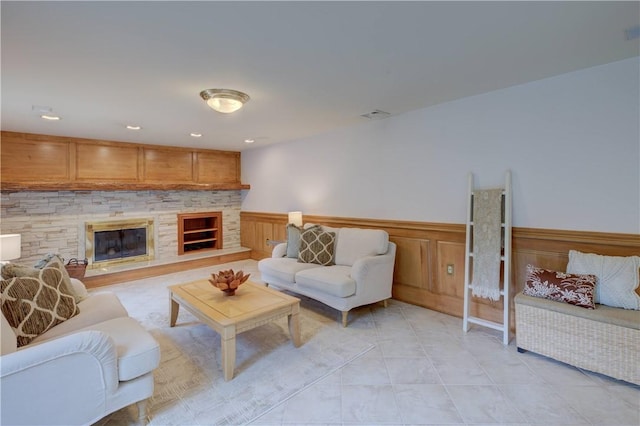 23 Pine Top Rd, Barrington, RI 02806 - living area featuring a wainscoted wall and a fireplace
