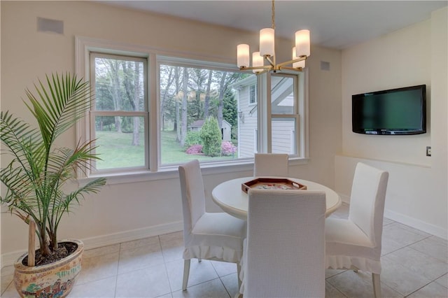 23 Pine Top Rd, Barrington, RI 02806 - tiled dining room featuring a chandelier and baseboards