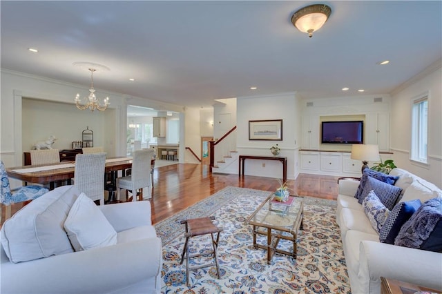 23 Pine Top Rd, Barrington, RI 02806 - living area with stairway, ornamental molding, healthy amount of natural light, wood finished floors, and recessed lighting