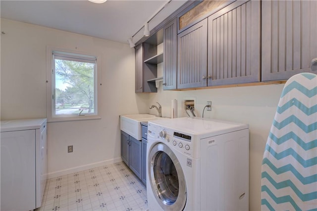 23 Pine Top Rd, Barrington, RI 02806 - laundry room featuring cabinet space, light floors, and washer and clothes dryer