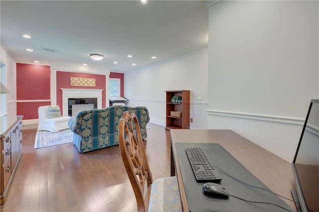 23 Pine Top Rd, Barrington, RI 02806 - dining area featuring ornamental molding, wood finished floors, a fireplace, and recessed lighting