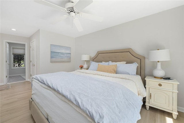 bedroom with recessed lighting, baseboards, ceiling fan, and light wood-type flooring