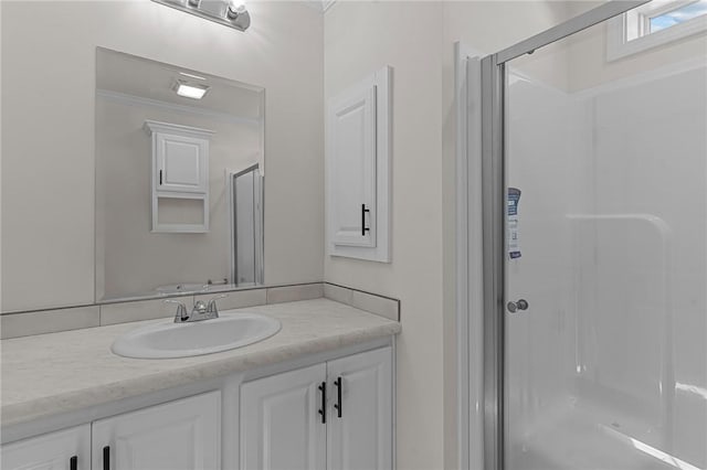 548 Kenyon Ave, Attleboro, MA 02703 - full bath with walk in shower, ornamental molding, and vanity