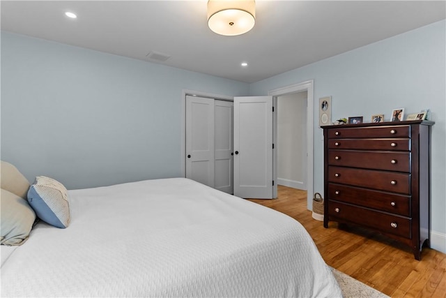 386 Stone Church Rd, Tiverton, RI 02878 - bedroom featuring wood finished floors, a closet, recessed lighting, and baseboards