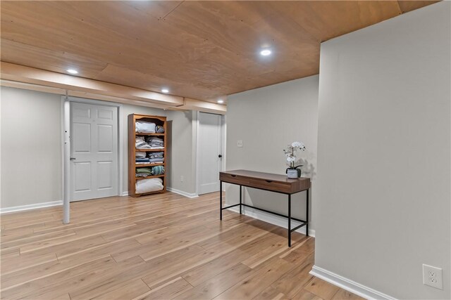 386 Stone Church Rd, Tiverton, RI 02878 - finished basement with light wood-style floors, recessed lighting, and baseboards