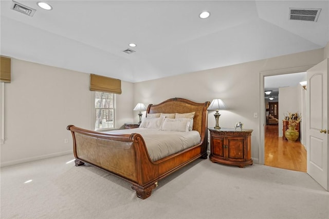 carpeted bedroom featuring recessed lighting and visible vents