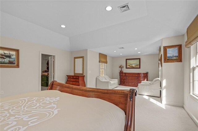 bedroom featuring light colored carpet, baseboards, visible vents, and recessed lighting