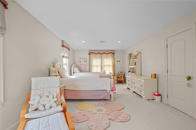 carpeted bedroom featuring visible vents and recessed lighting