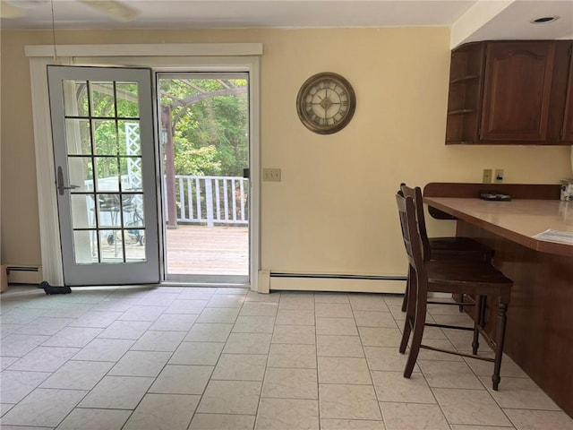 1 Gilman Rd, Hopkinton, RI 02832 - dining room with a baseboard radiator and light tile patterned flooring