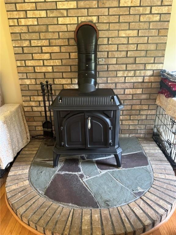 1 Gilman Rd, Hopkinton, RI 02832 - detailed view of a wood stove and brick wall