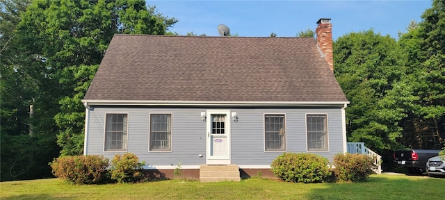 1 Gilman Rd, Hopkinton, RI 02832 - cape cod home featuring a front yard, a chimney, entry steps, and roof with shingles