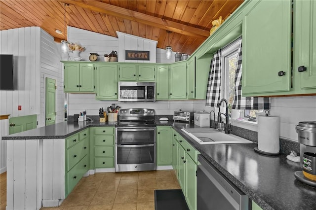 kitchen with appliances with stainless steel finishes, green cabinets, wooden ceiling, wooden walls, and a peninsula