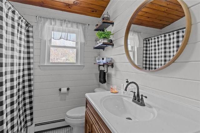bathroom featuring toilet, vanity, a baseboard radiator, a shower with shower curtain, and wood walls