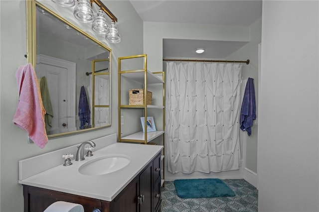 full bath with vanity, tile patterned floors, and shower / bath combo