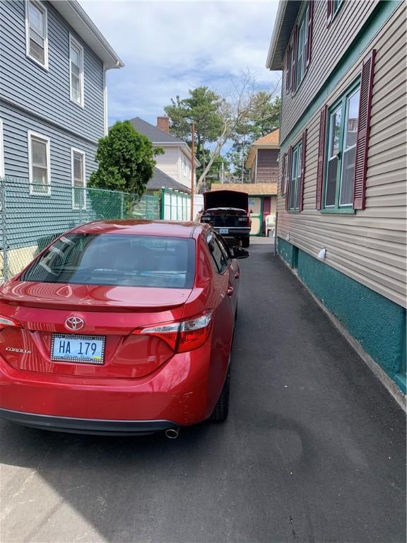 31 Ponagansett Ave, Providence, RI 02909 - view of parking / parking lot with fence
