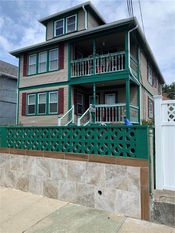 31 Ponagansett Ave, Providence, RI 02909 - view of front of home featuring fence and a balcony