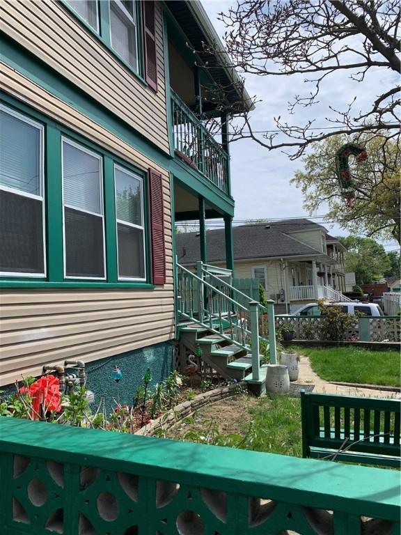 31 Ponagansett Ave, Providence, RI 02909 - view of property exterior featuring a balcony