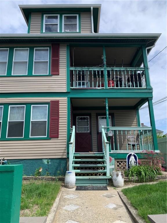 31 Ponagansett Ave, Providence, RI 02909 - view of front of home featuring covered porch and a balcony