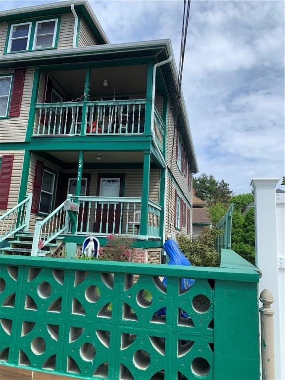 31 Ponagansett Ave, Providence, RI 02909 - view of front of home featuring a balcony and covered porch