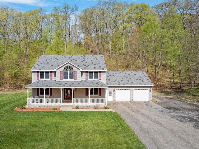 825 Woonsocket Hill Rd, North Smithfield, RI 02896 - view of front of home featuring a porch, a garage, aphalt driveway, and a front yard