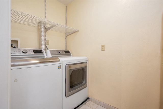 825 Woonsocket Hill Rd, North Smithfield, RI 02896 - washroom featuring independent washer and dryer, laundry area, and light tile patterned floors