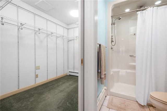 825 Woonsocket Hill Rd, North Smithfield, RI 02896 - full bathroom featuring a stall shower, a baseboard heating unit, and toilet