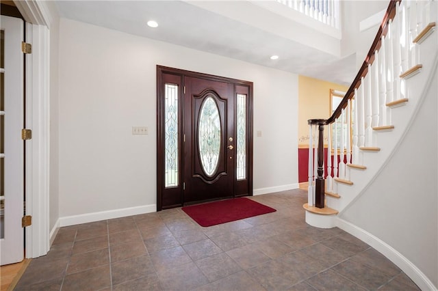 825 Woonsocket Hill Rd, North Smithfield, RI 02896 - foyer entrance featuring baseboards, stairs, and a wealth of natural light