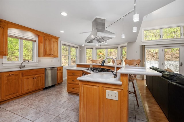 825 Woonsocket Hill Rd, North Smithfield, RI 02896 - kitchen with a kitchen bar, island exhaust hood, a sink, dishwasher, and a wealth of natural light