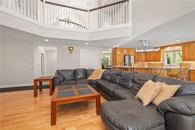 825 Woonsocket Hill Rd, North Smithfield, RI 02896 - living area with baseboards, recessed lighting, light wood finished floors, and track lighting