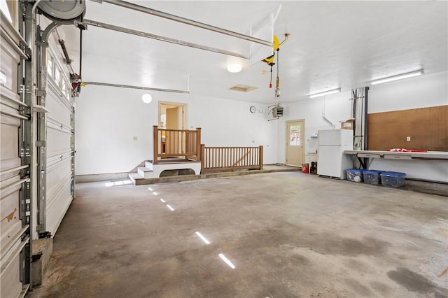 825 Woonsocket Hill Rd, North Smithfield, RI 02896 - garage featuring freestanding refrigerator