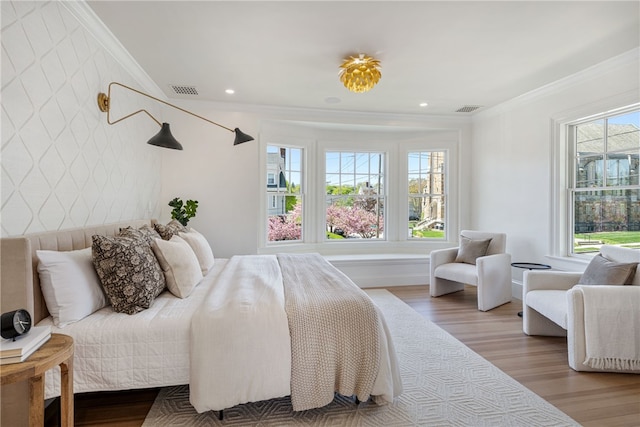 349 Wayland Ave, Providence, RI 02906 - bedroom with light wood-type flooring, crown molding, recessed lighting, and baseboards