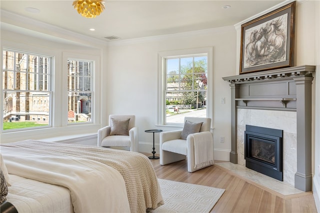 349 Wayland Ave, Providence, RI 02906 - bedroom with wood finished floors, a premium fireplace, ornamental molding, recessed lighting, and baseboards