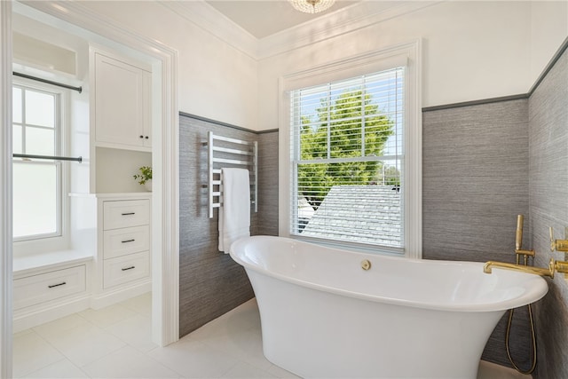 349 Wayland Ave, Providence, RI 02906 - full bath with tile patterned flooring, a freestanding tub, radiator, a towel warmer, and tile walls