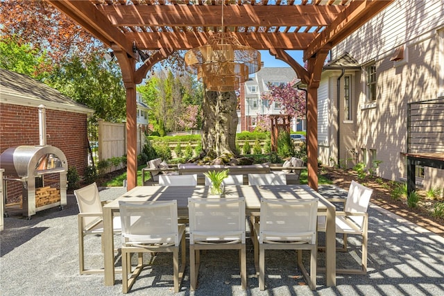 349 Wayland Ave, Providence, RI 02906 - view of patio featuring a pergola, fence, and outdoor dining area
