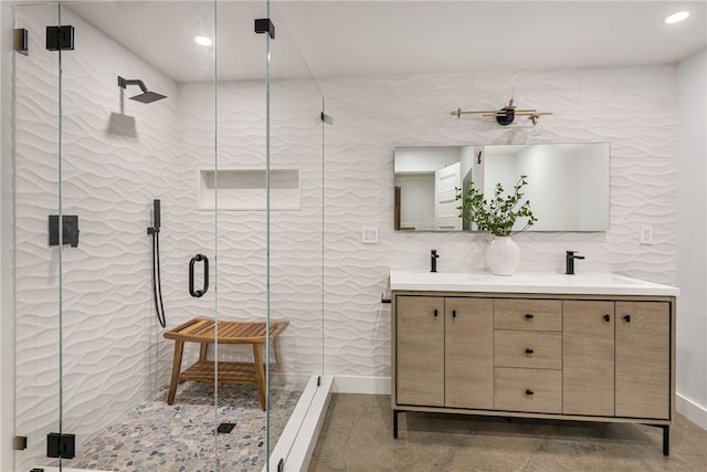 349 Wayland Ave, Providence, RI 02906 - bathroom with recessed lighting, baseboards, a stall shower, double vanity, and tile walls