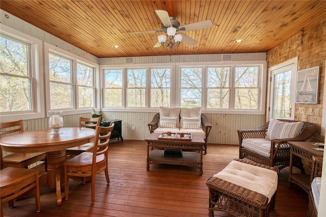 27 Tom Harvey Rd, Westerly, RI 02891 - sunroom / solarium featuring hardwood / wood-style floors, wooden ceiling, wood walls, plenty of natural light, and a deck