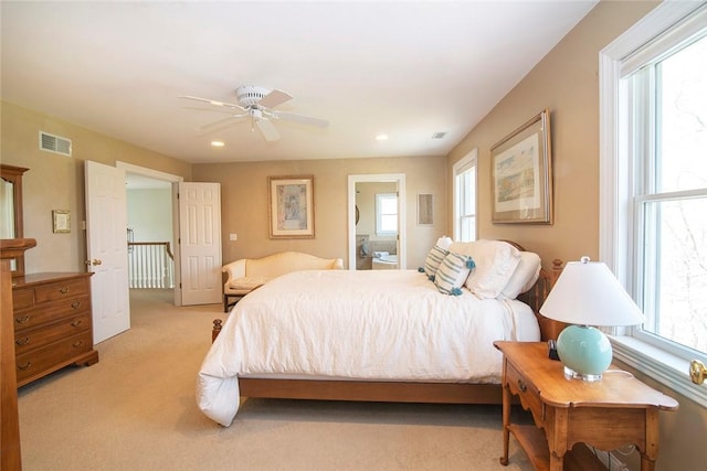 27 Tom Harvey Rd, Westerly, RI 02891 - bedroom with multiple windows, light carpet, recessed lighting, a ceiling fan, and ensuite bathroom