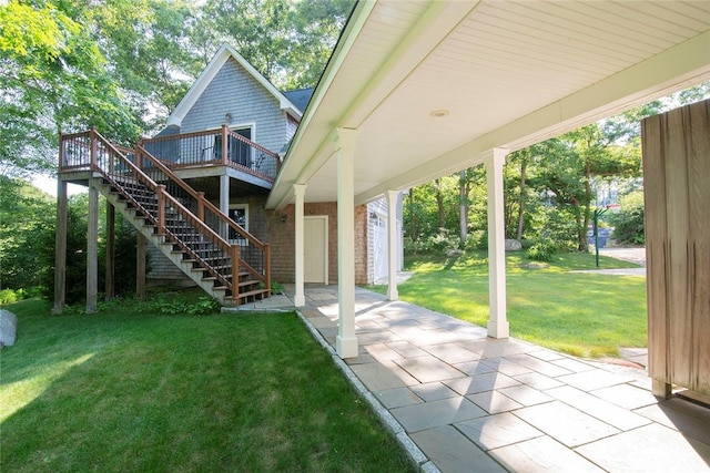 27 Tom Harvey Rd, Westerly, RI 02891 - rear view of house featuring stairs, a lawn, and a deck