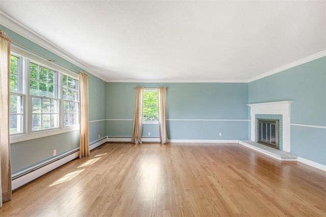 28 Potter Hill Rd, Westerly, RI 02891 - unfurnished living room featuring a baseboard radiator, light wood finished floors, crown molding, baseboards, and a fireplace
