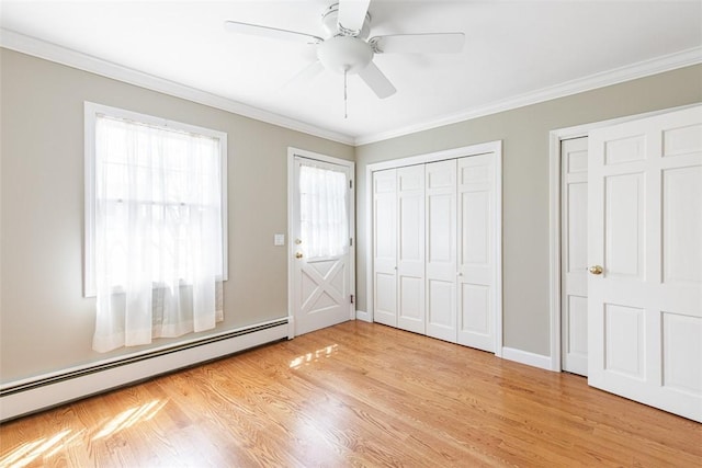 28 Potter Hill Rd, Westerly, RI 02891 - unfurnished bedroom with a baseboard heating unit, light wood finished floors, ornamental molding, ceiling fan, and baseboards