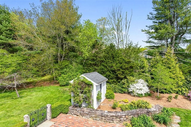 28 Potter Hill Rd, Westerly, RI 02891 - view of green lawn featuring a storage unit and an outdoor structure
